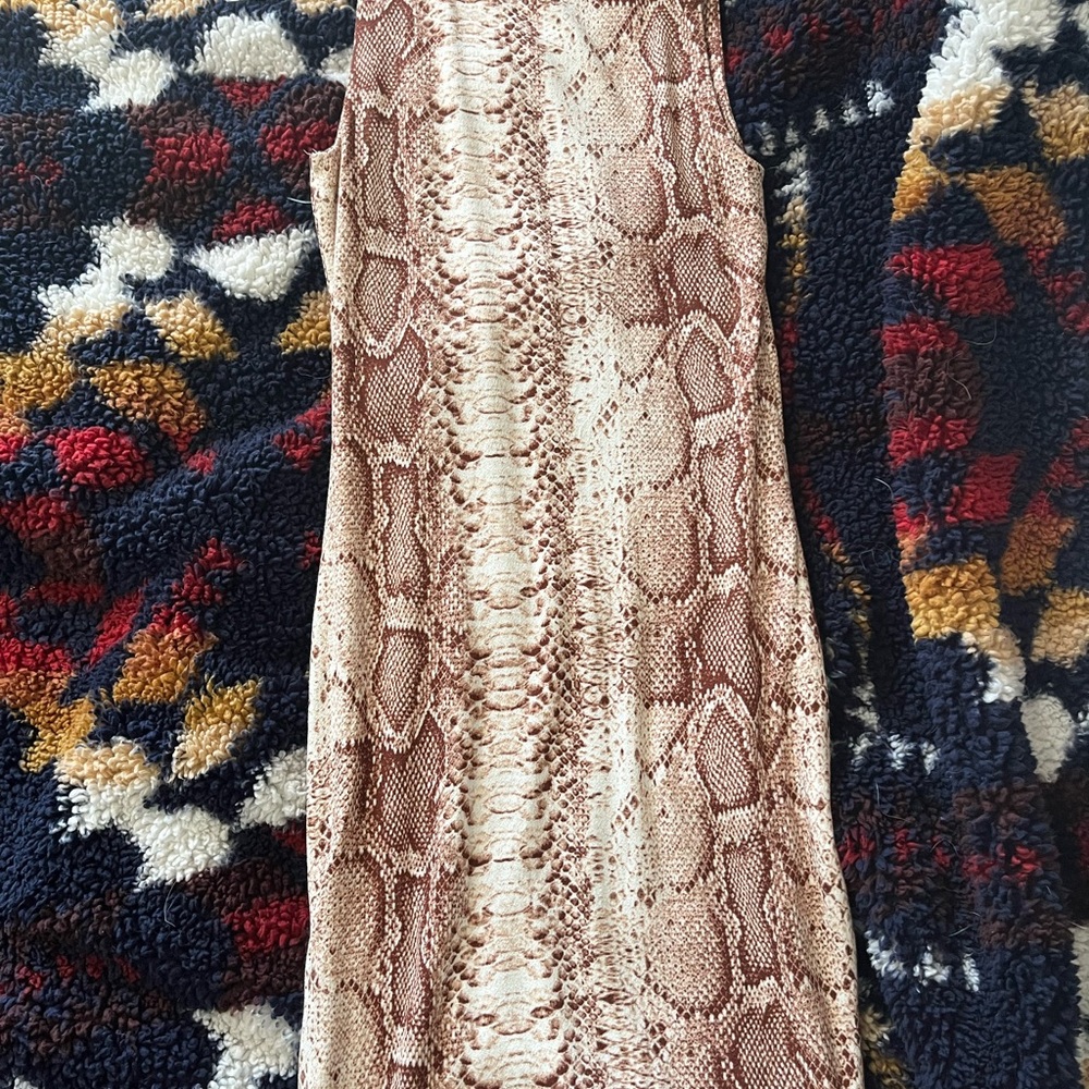 Never worn bought for a photo shoot but never happened strong material